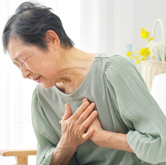 Asian,Senior,Woman,Having,A,Palpitation,Of,The,Heart,At