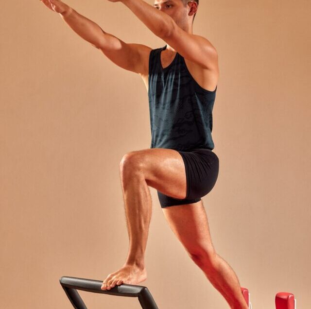 Fit,Man,Doing,A,Lunge,Stretch,Yoga,Pilates,Exercise,To